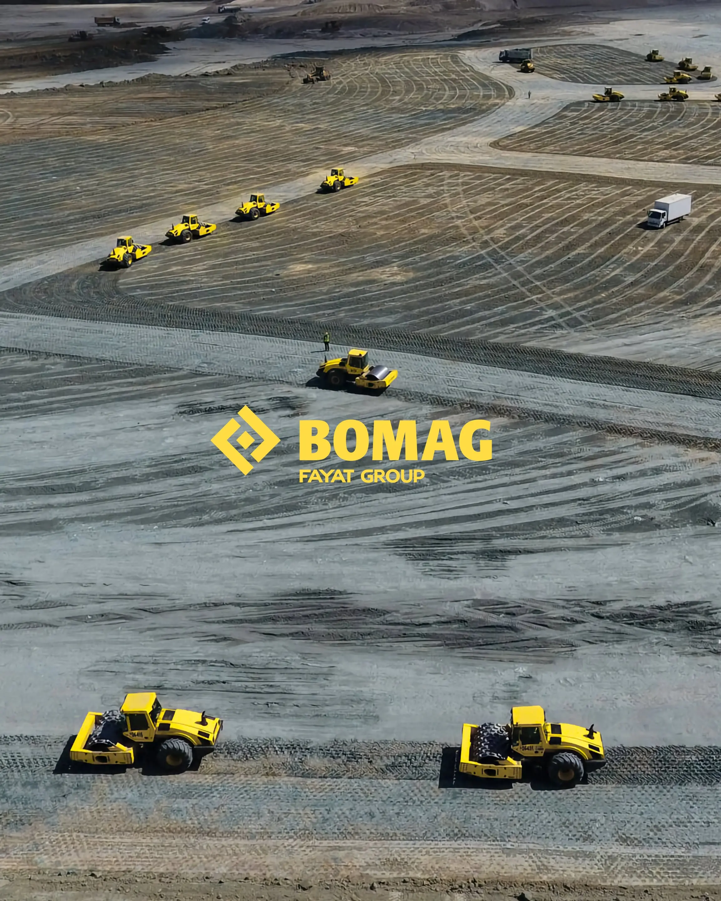 Planierende BOMAG Geräte und BOMAG Logo
